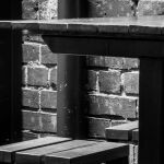 Table against the wall by Ken Marsh